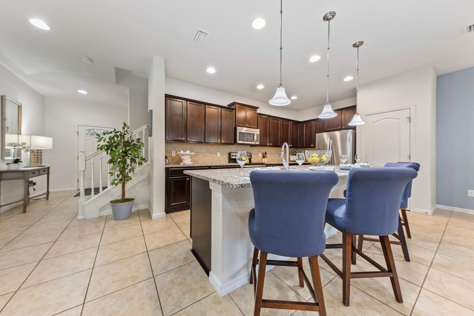 Where style meets function — upgraded countertops and stainless steel appliances ready for your culinary creations.