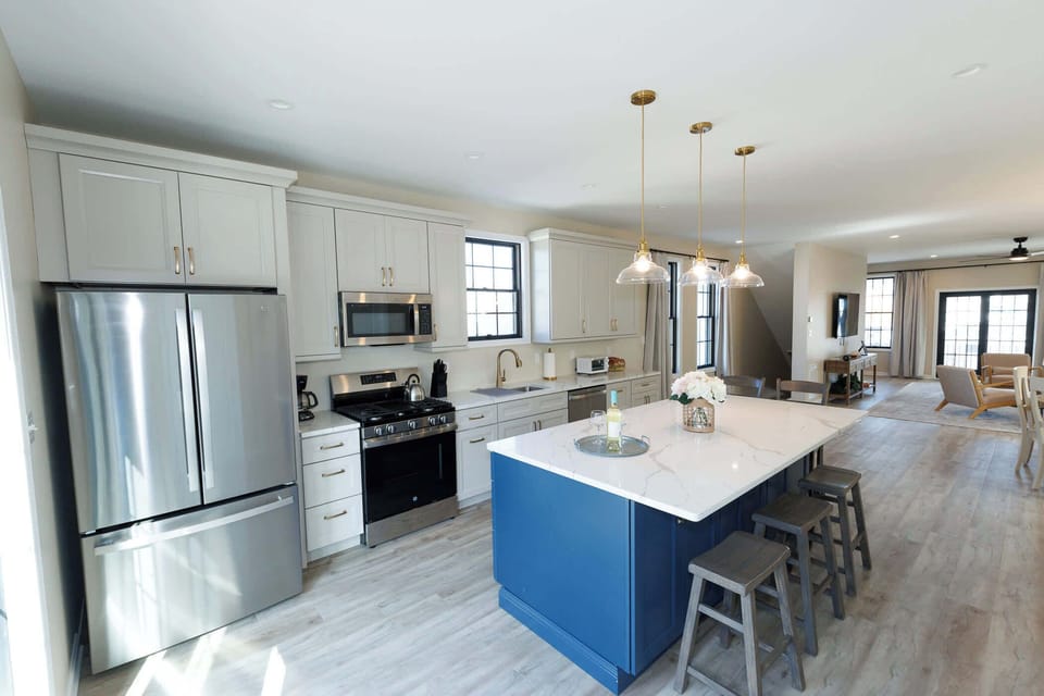 Fully equipped modern kitchen with high-end appliances.