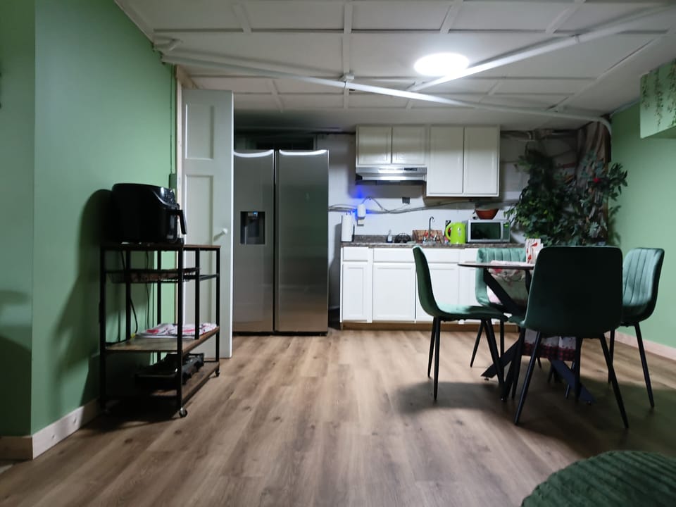 Enjoy a meal at the dining area, complete with a cozy setup that feels just like