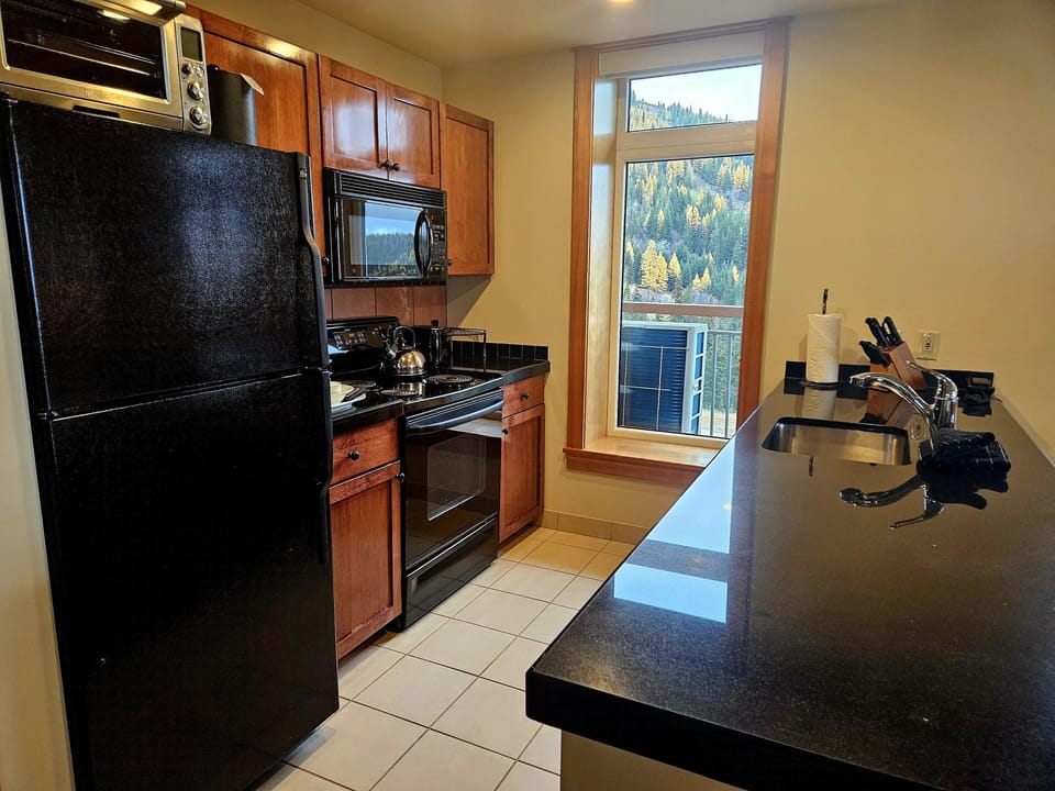 Floor, Flooring, Indoors, Appliance, Refrigerator