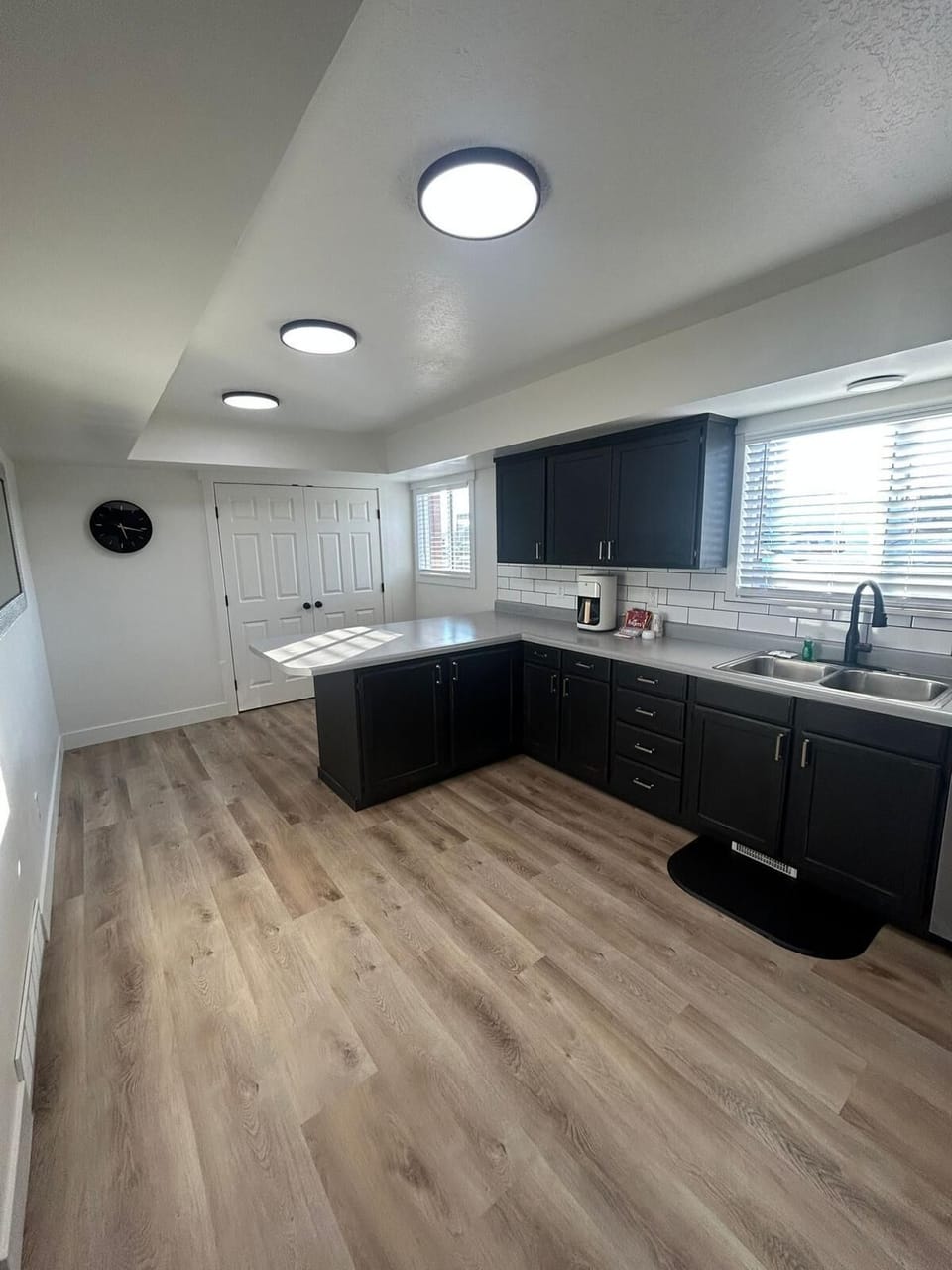 Family Townhome | Private kitchen | Full-size fridge, microwave, coffee/tea maker, toaster