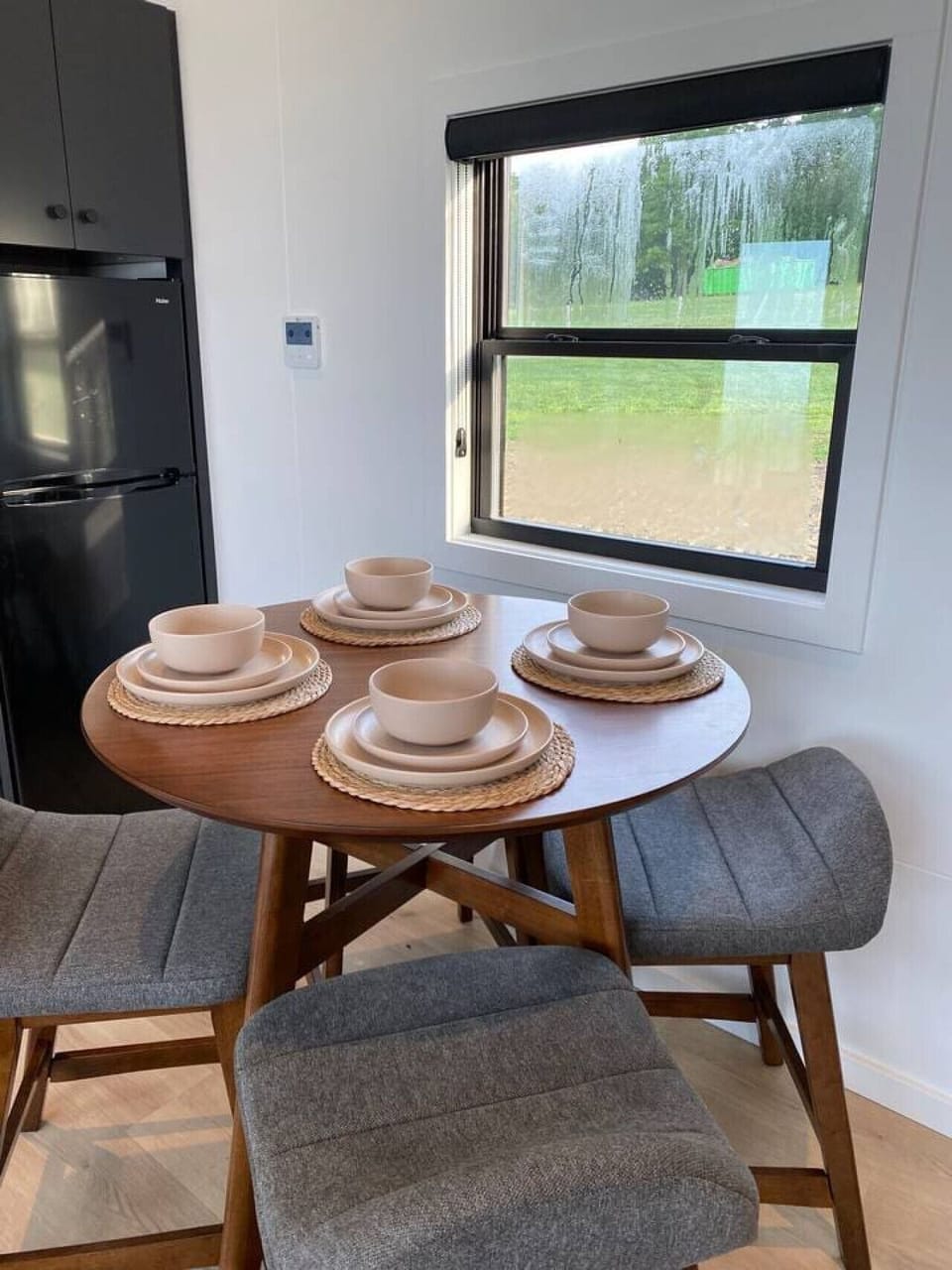 Cozy dining space overlooking the living area.
