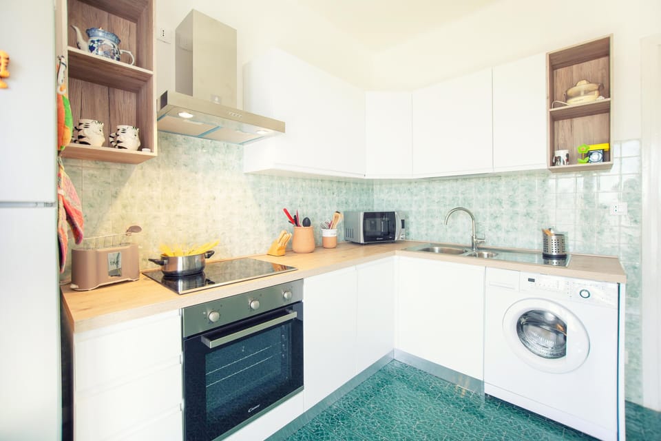 Apartment, 2 Bedrooms, Sea View | Private kitchen | Fridge, microwave, oven, stovetop