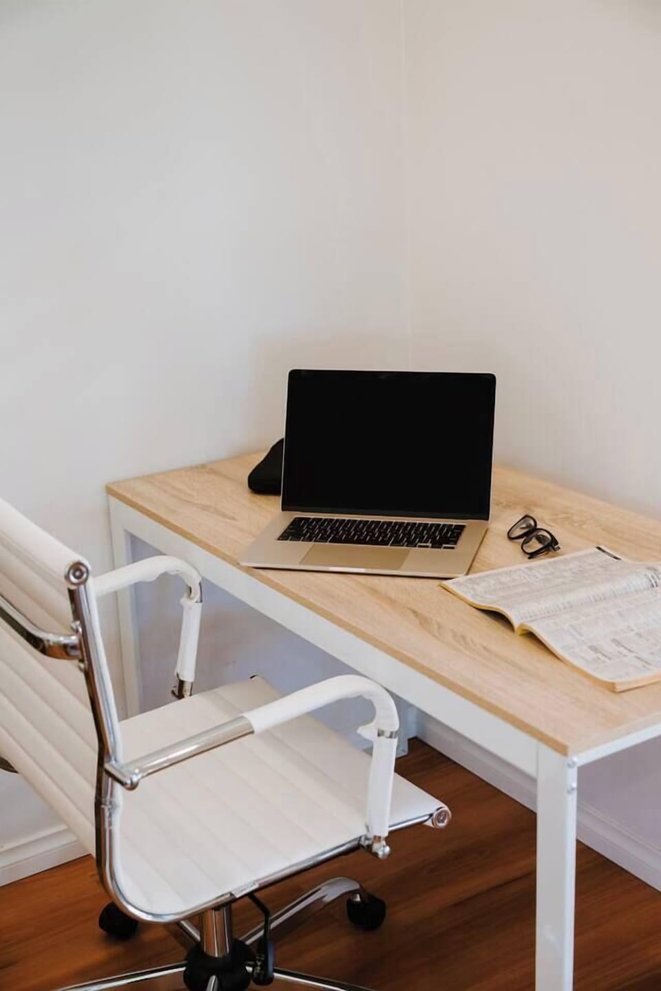 The desk and ergonomic chair provide a quiet setting for focused work.