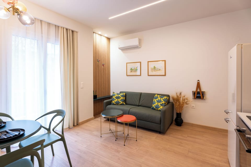 Superior Apartment Suite, Sea View | Living area | Printers