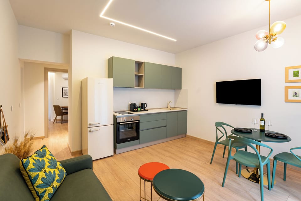 Superior Apartment Suite, Sea View | Living area | Printers