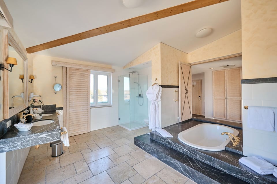Penthouse Suite | Bathroom | Free toiletries, hair dryer, bathrobes, slippers