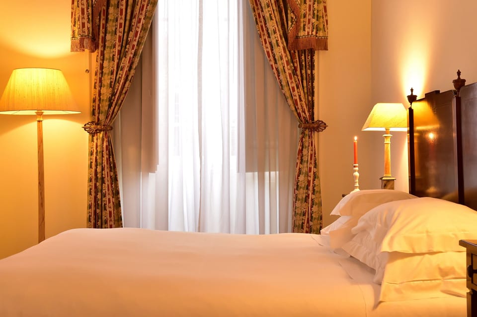 Standard Double or Twin Room | Minibar, in-room safe, desk, blackout drapes