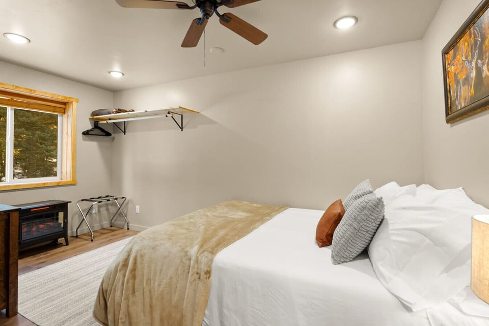 Queen Bed, Hanging Clothing Storage, Heater, Luggage Rack
