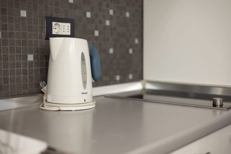 Comfort Studio | Private kitchen | Full-size fridge, oven, stovetop, dishwasher