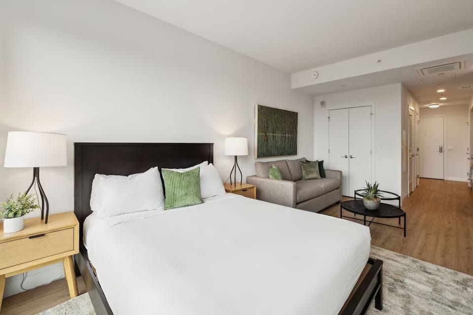 Stretch out in bed with lounge seating just steps away.