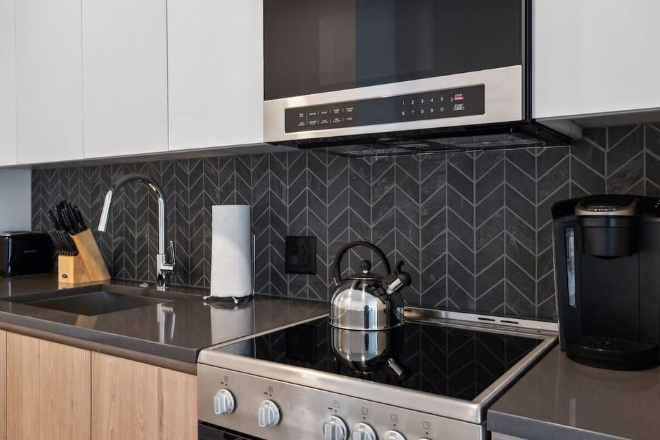 Brew coffee and whip up bites on polished counters.