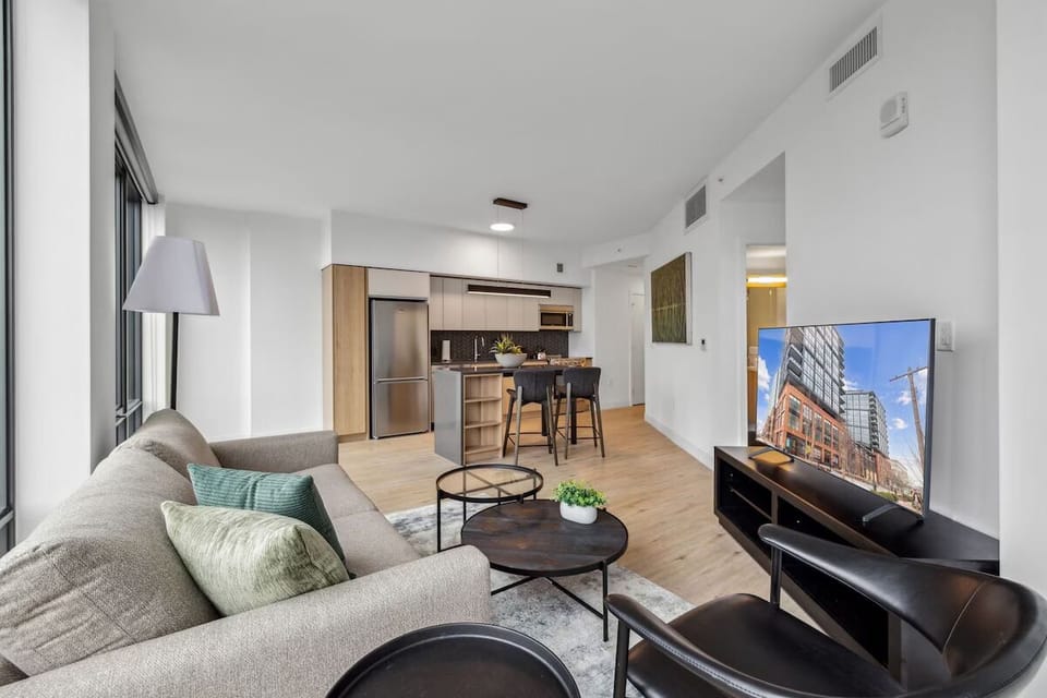 Settle into an airy open-plan lounge with modern comforts.