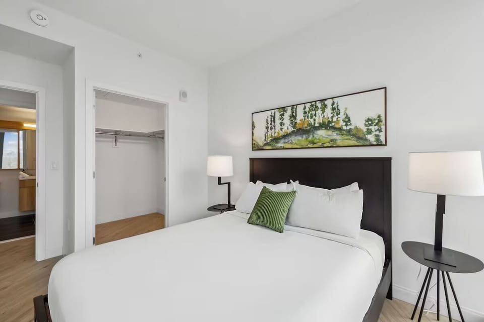 Unwind in a serene bedroom with generous closet storage.