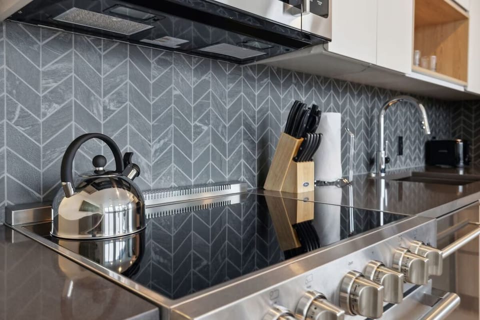 Enjoy upscale finishes and a polished backsplash for easy cooking.