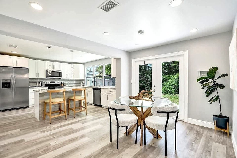 Open-plan dining area with garden door views