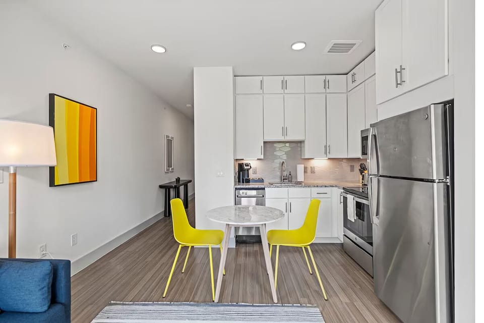 Cook effortlessly with stainless appliances and a cozy dine-in table.