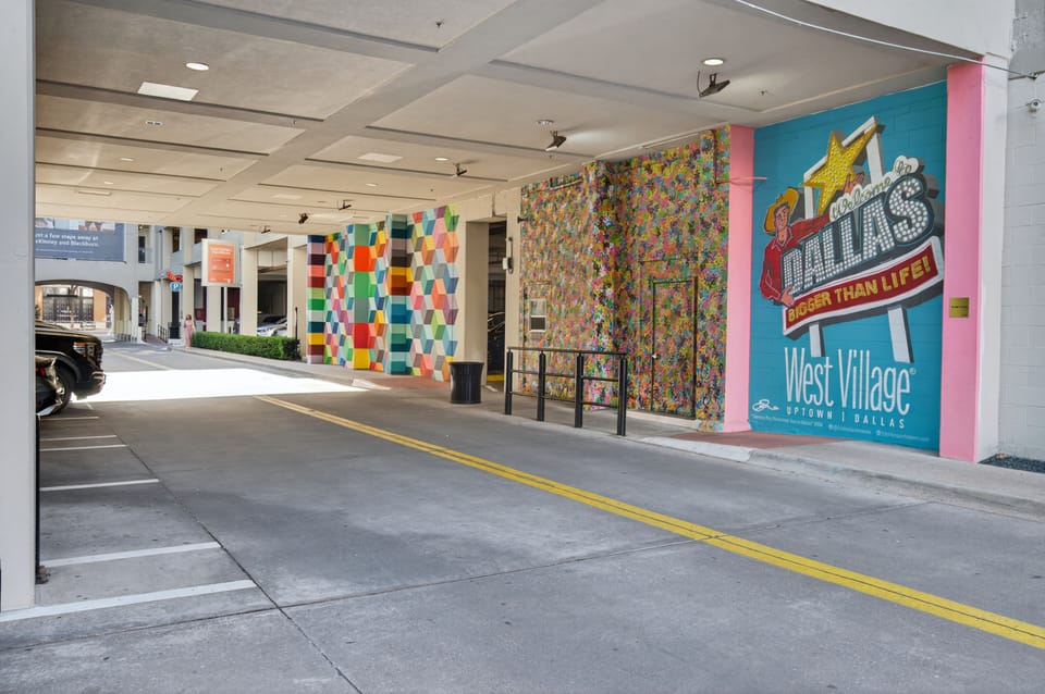 Colorful garage mural bringing a fun, welcoming vibe to parking area.