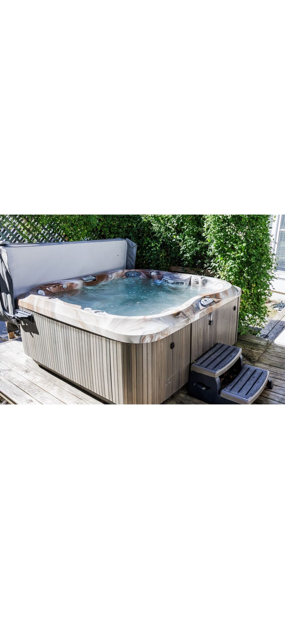Enjoy the hot tub after a long day of skiing and snowboarding!
