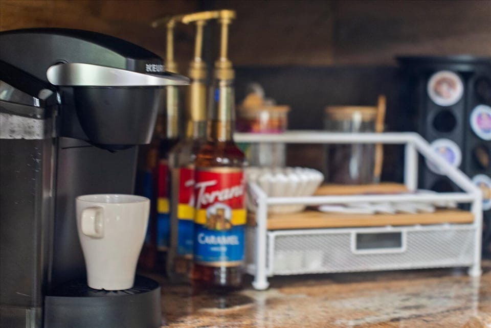Start your mornings right with the fully stocked coffee and syrup bar for your favorite brew.