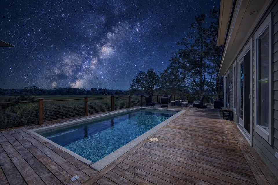 Starry-night swim. Poolside under the Milky Way.