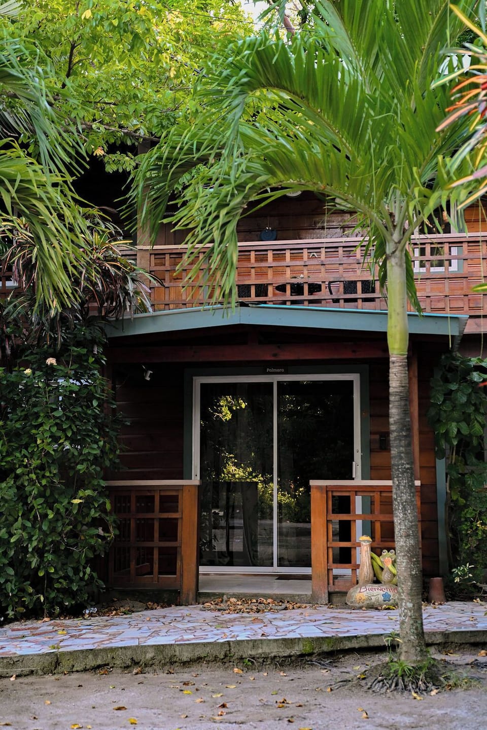 Your room is located on the second floor, embraced by vibrant island nature 