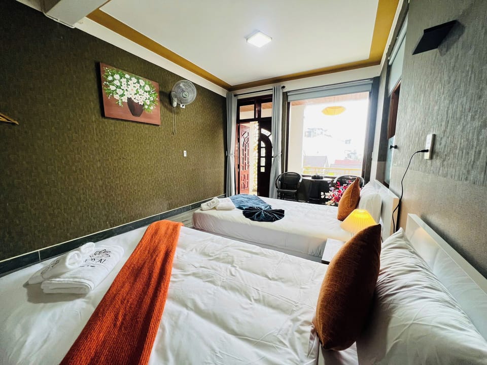 Deluxe Twin Room, Balcony | In-room safe, desk, laptop workspace, blackout drapes