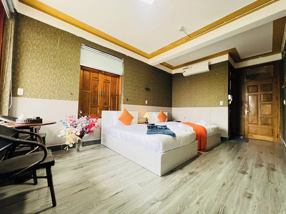 Deluxe Twin Room, Balcony | In-room safe, desk, laptop workspace, blackout drapes