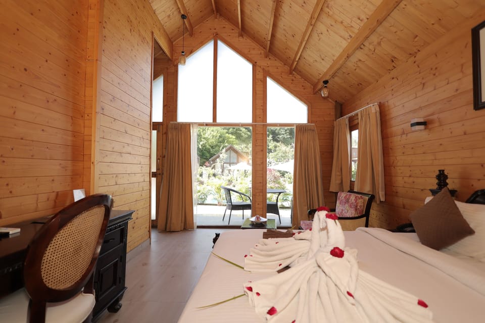 Junior Cottage, Pool View | Desk, iron/ironing board (on request), WiFi (free)