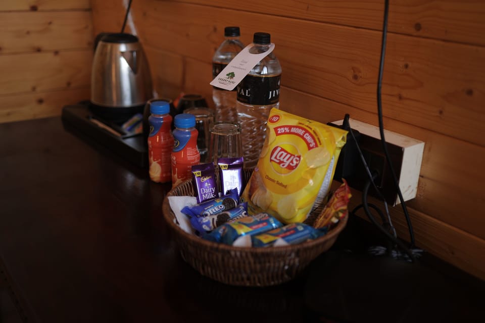 Junior Cottage, Pool View | Room amenity
