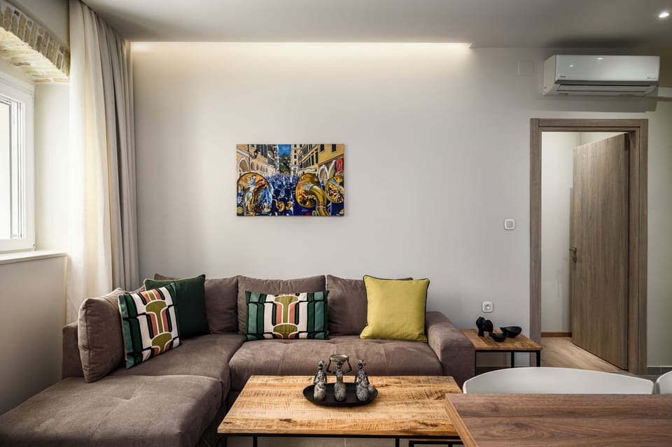 Superior Apartment, 1 Queen Bed with Sofa bed | Living area | 32-inch Smart TV with digital channels