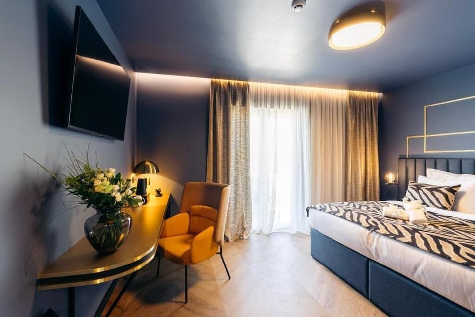 Luxury Double Room, Balcony, Sea View | In-room safe, desk, laptop workspace, blackout drapes