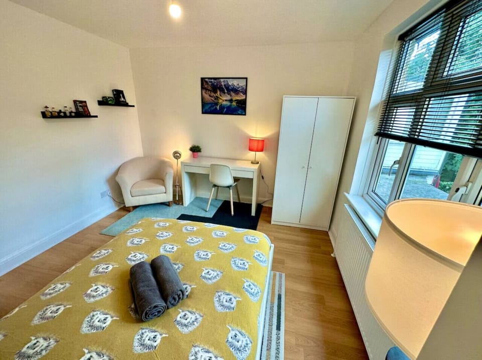 Light-filled bedroom with yellow accents