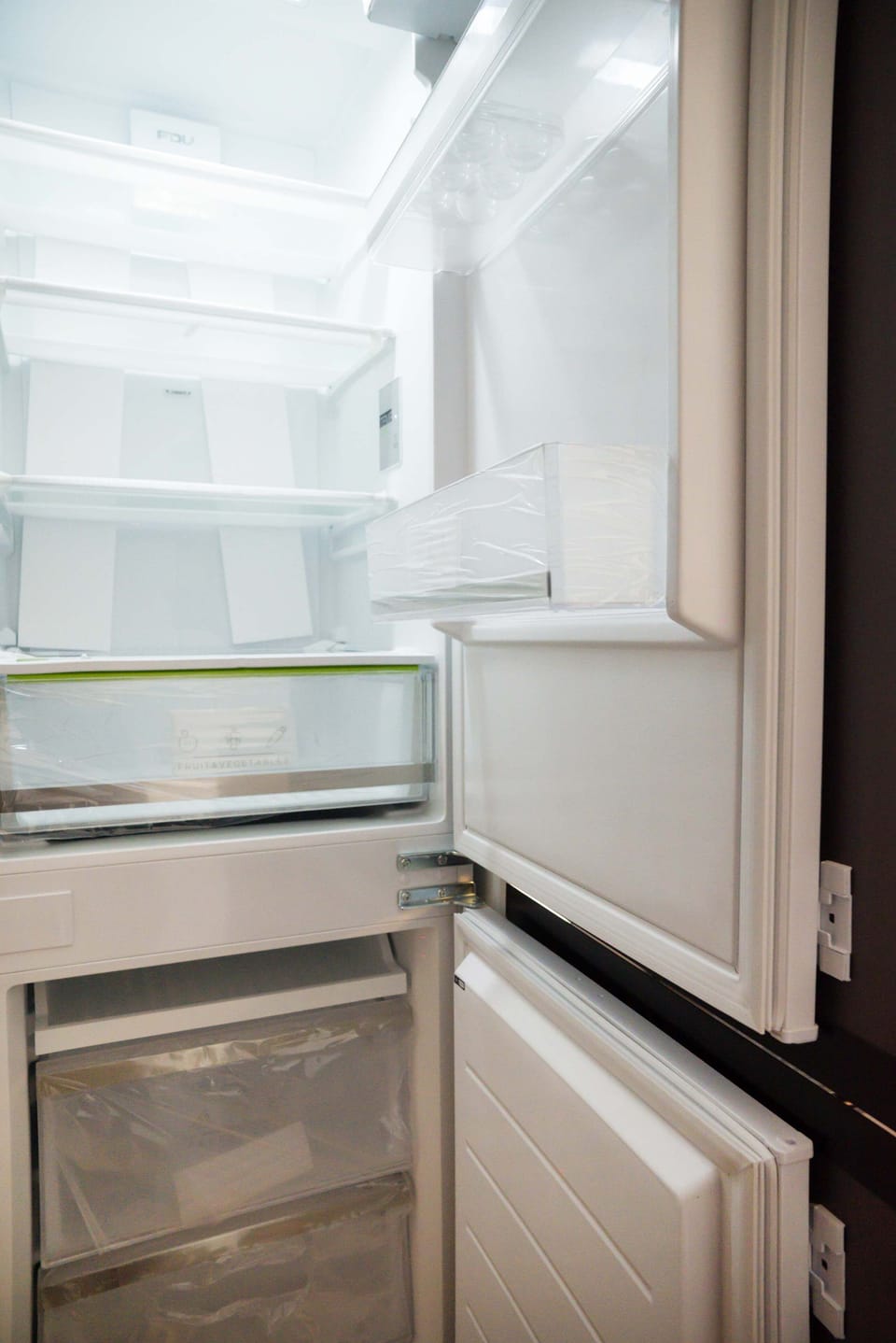 Spacious fridge ready to store your fresh groceries during your stay.