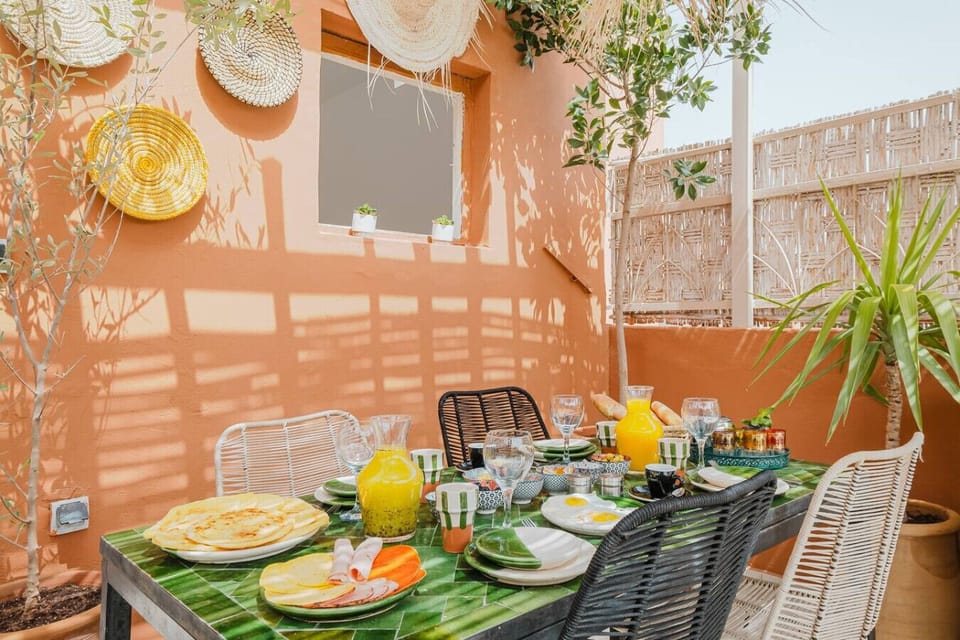 Enjoy breakfast with fresh air and city views.