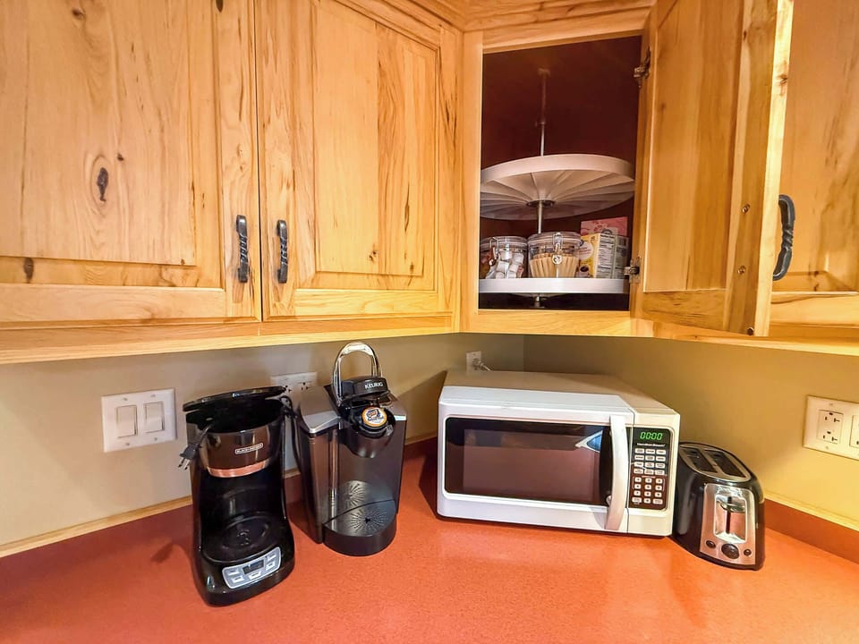 Coffee supplies for a Keurig and drip coffee are both provided. 