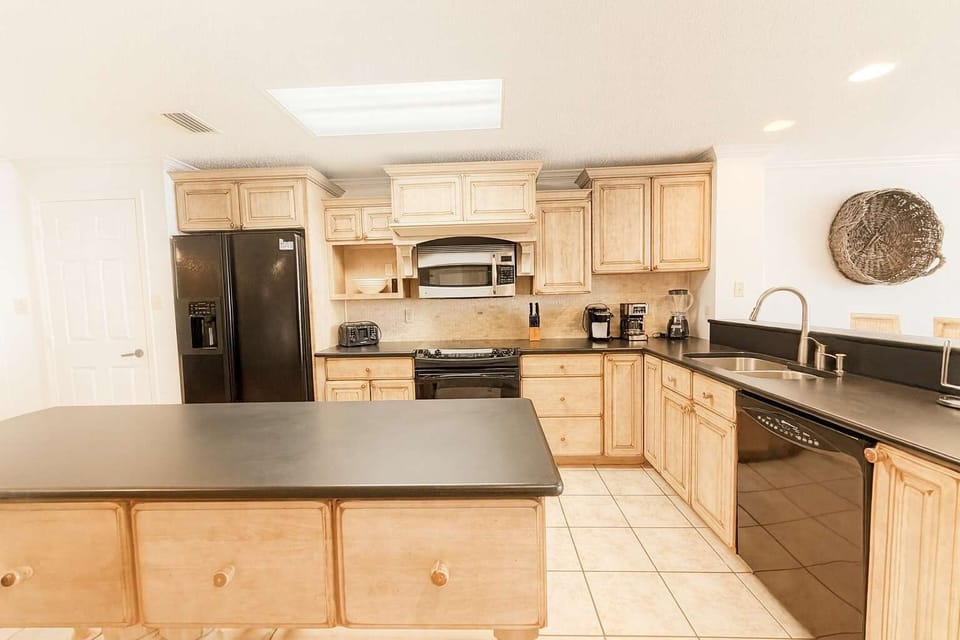 Large island kitchen with ample counter space.