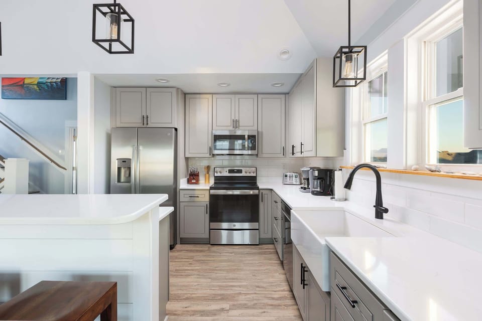 Top Level: Kitchen Area
Fully equipped kitchen featuring GE stainless steel appliances, granite countertops, and both Keurig and drip coffee makers.