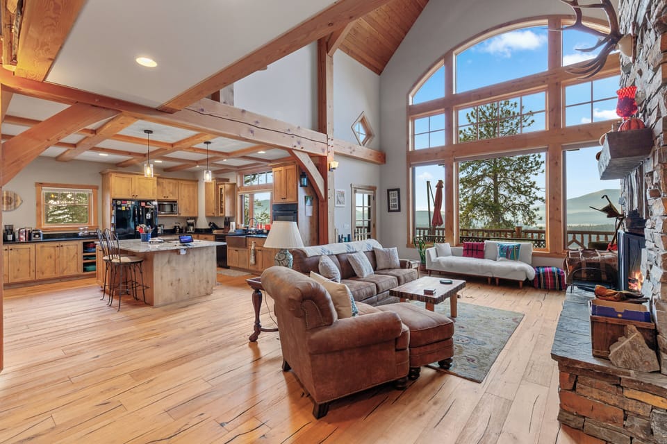 Open Kitchen/Living Room - Cozy up in style- this living room is perfect for relaxation and gathering. Includes a fireplace and Smart TV