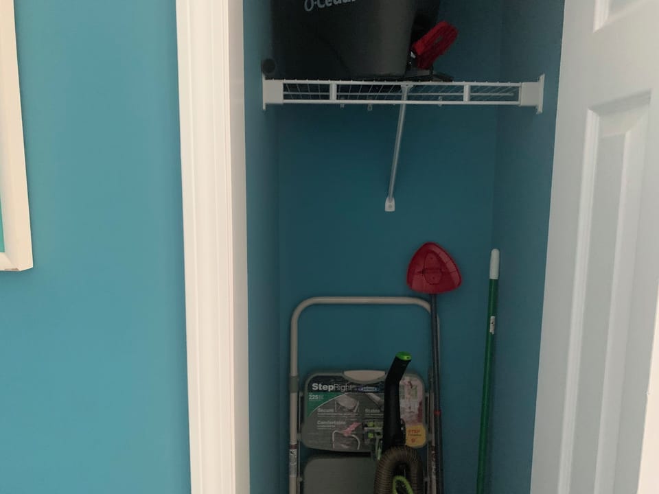 closet with vacuum and handy stuff
