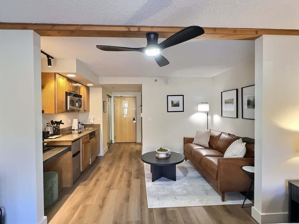 Pull-out sofa and the kitchenette | Listed with @BookTraverse