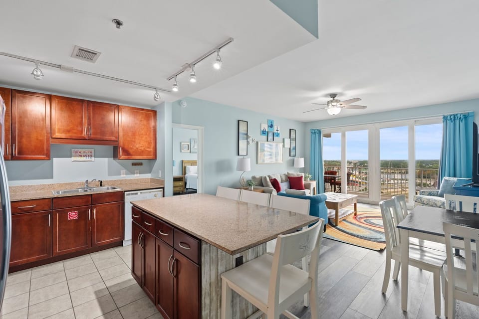 Open-concept kitchen and living area with ocean views and natural light