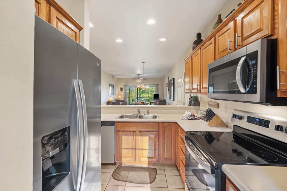 The warm, open kitchen offers ample space & all the comforts of home​