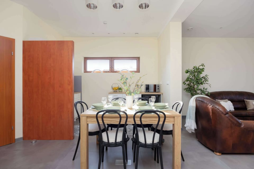 Bright dining space connecting seamlessly to the living room.