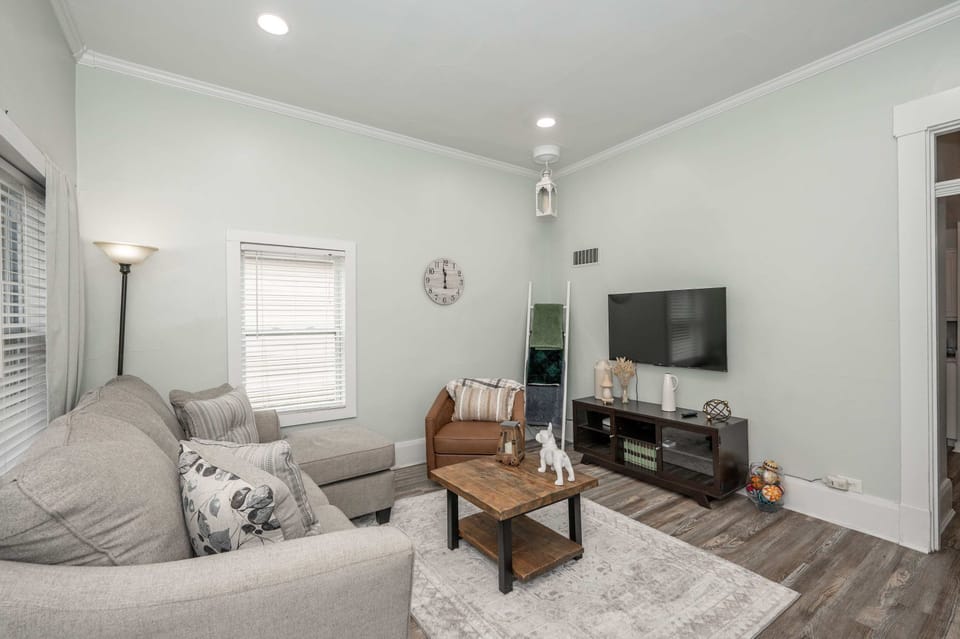 Curl up in the airy living room & stream your favorites on the smart TV​