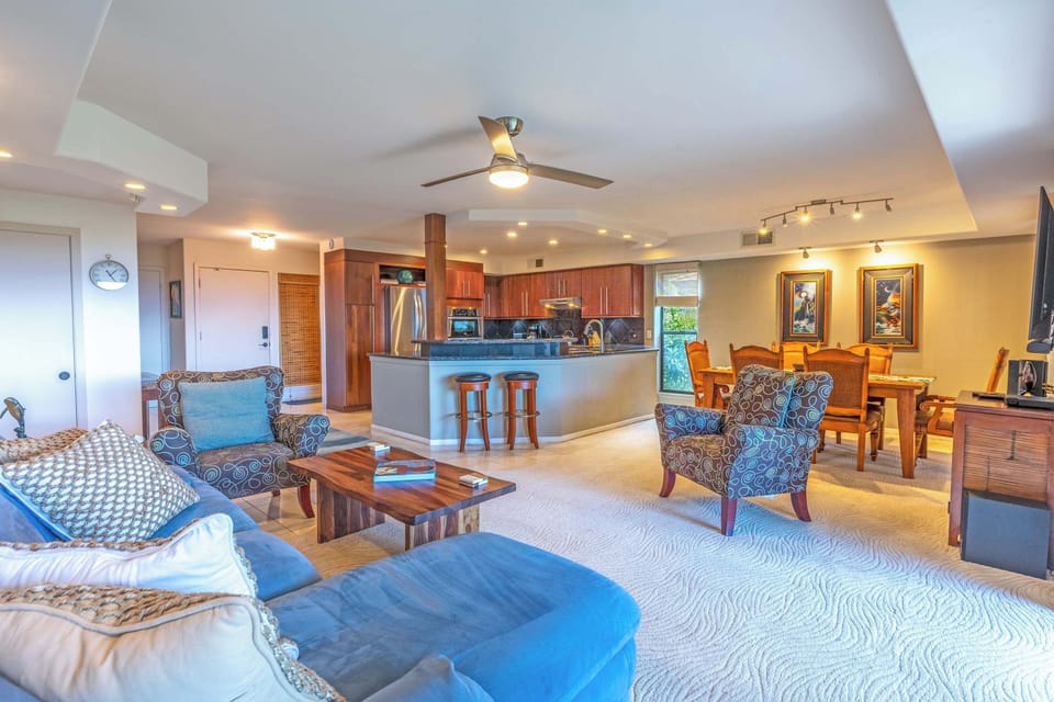 Spacious open-concept living space with ocean views and plenty of places to relax.