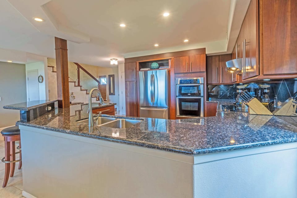 Large Kitchen with lots of counter space and counter seating options.