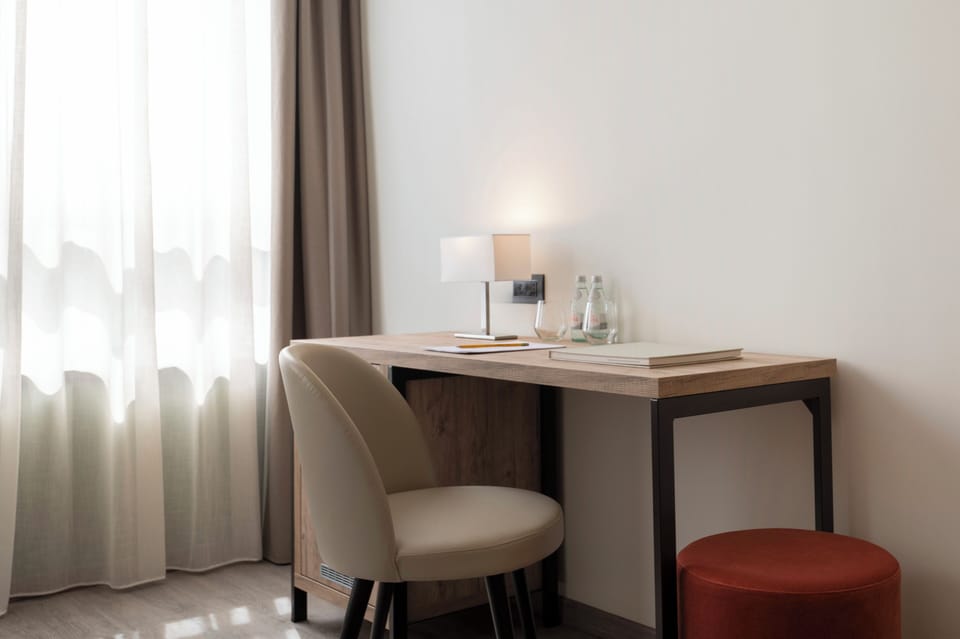 Family Suite | Minibar, in-room safe, desk, laptop workspace