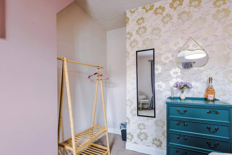 The master bedroom features a superking bed which can be configured into 2 singles. The room has everything you need to unpack - with a chest of drawers and hanging rail for your belongings.
