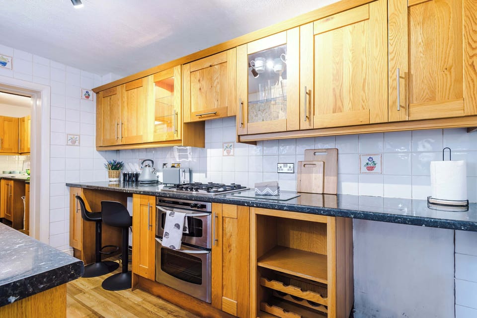 The long kitchen features a washing machine, oven, toaster, kettle and microwave and is fully equipped with everything you need to cook meals away from home. The original banking vaults are even still there for you to admire!